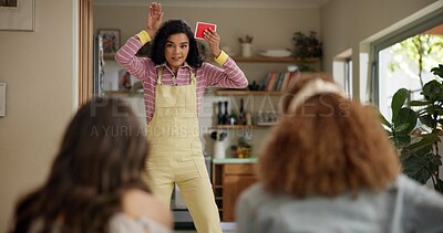 Buy stock photo Woman, acting and games in home with friends for entertainment, fun and bonding together. Female person, playing pantomime and party for weekend, social gathering or activity in living room at house