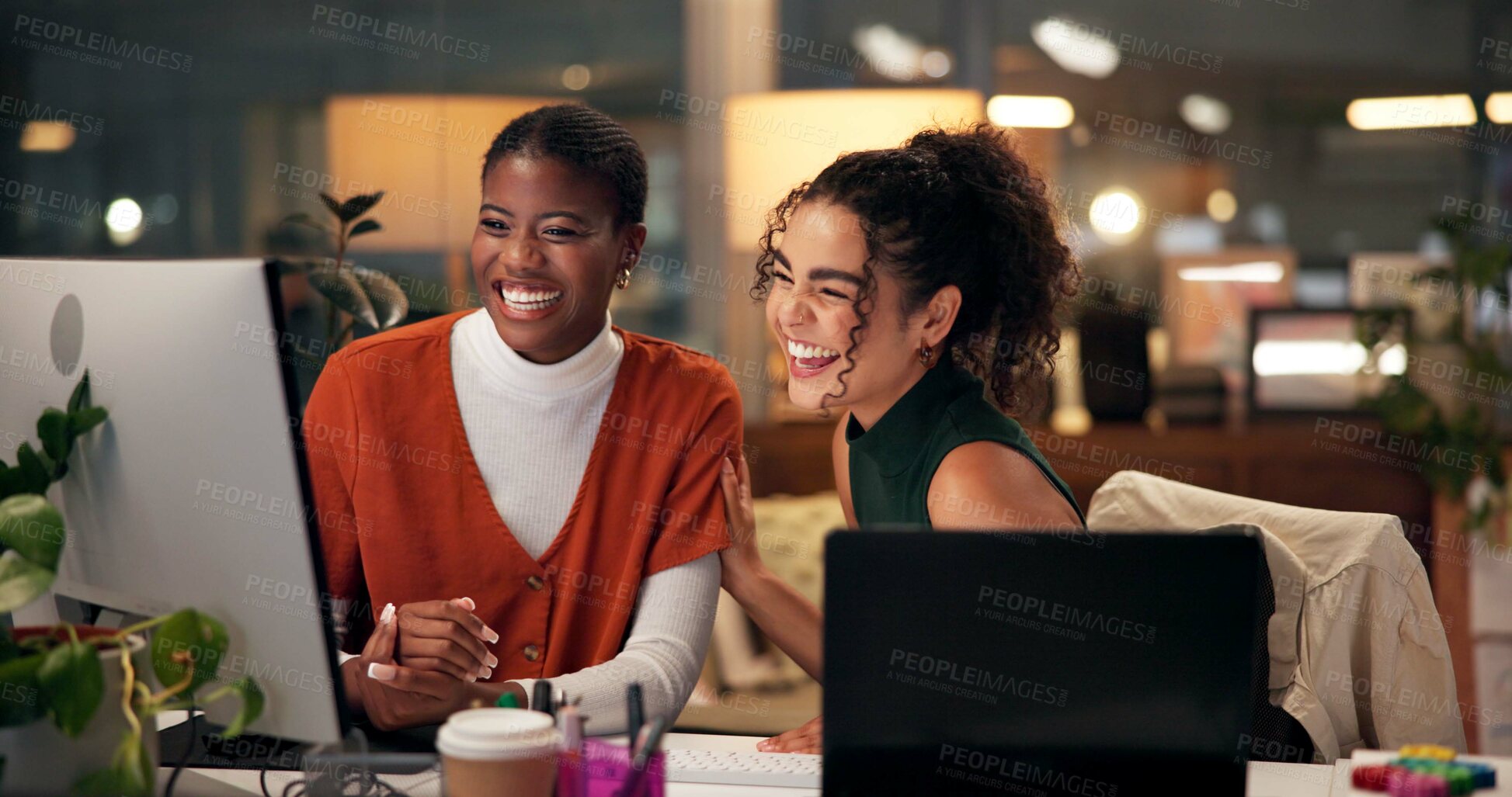 Buy stock photo Employees, computer and laughing in office at night, magazine editor and manager for helping staff. Women, publishing agency and online for cover design, talking and brainstorming for project plan