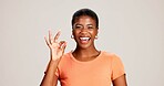 Perfect, portrait and woman with hand sign on studio background for agreement, feedback approval or review. Black person, happy and like emoji on mockup space for support, satisfaction or thank you