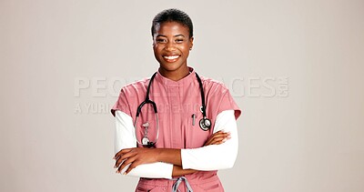 Buy stock photo Black woman, doctor and portrait in studio with confidence, career pride or smile at mockup space. Healthcare, cardiologist or happy at white background with arms crossed for medical service in Kenya