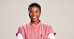 Black woman, doctor and portrait in studio with smile, career pride or confident at mockup space. Healthcare, cardiologist or happy at white background with arms crossed for medical service in Kenya