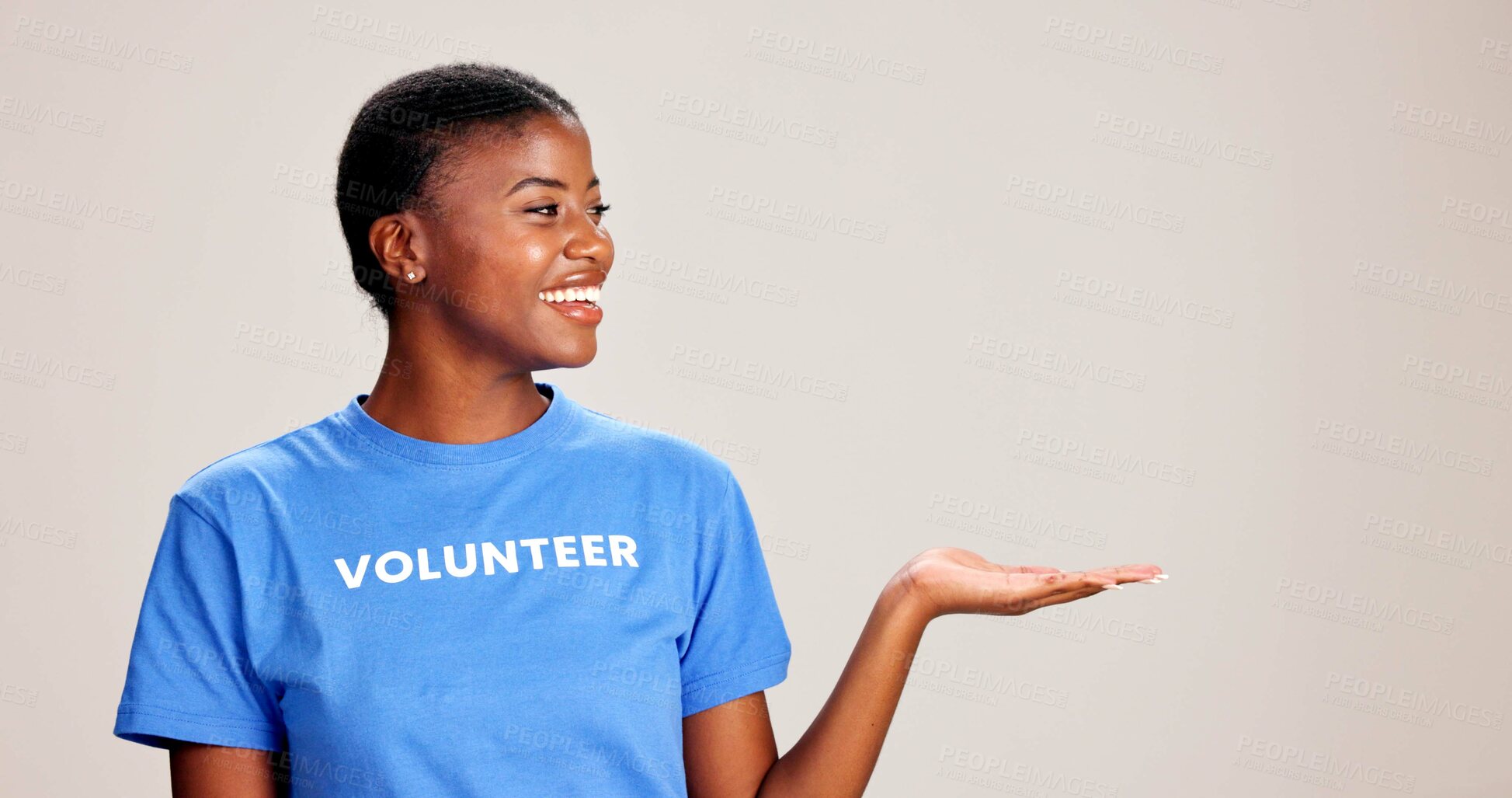 Buy stock photo Happy, black woman or volunteer with hand out in studio for charity or community service on a white background. African, female person or NGO with palm for advertising or awareness on mockup space