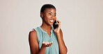 Happy, black woman and talking with phone call in studio for communication or discussion on a white background. African, female person or model speaking on mobile smartphone for conversation or chat