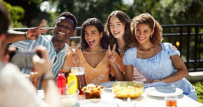 Buy stock photo Friends, lunch or smile with photography outdoor for new year celebration, bonding together or profile picture update. Happy memory, diversity people or peace sign on terrace for festive party or bbq