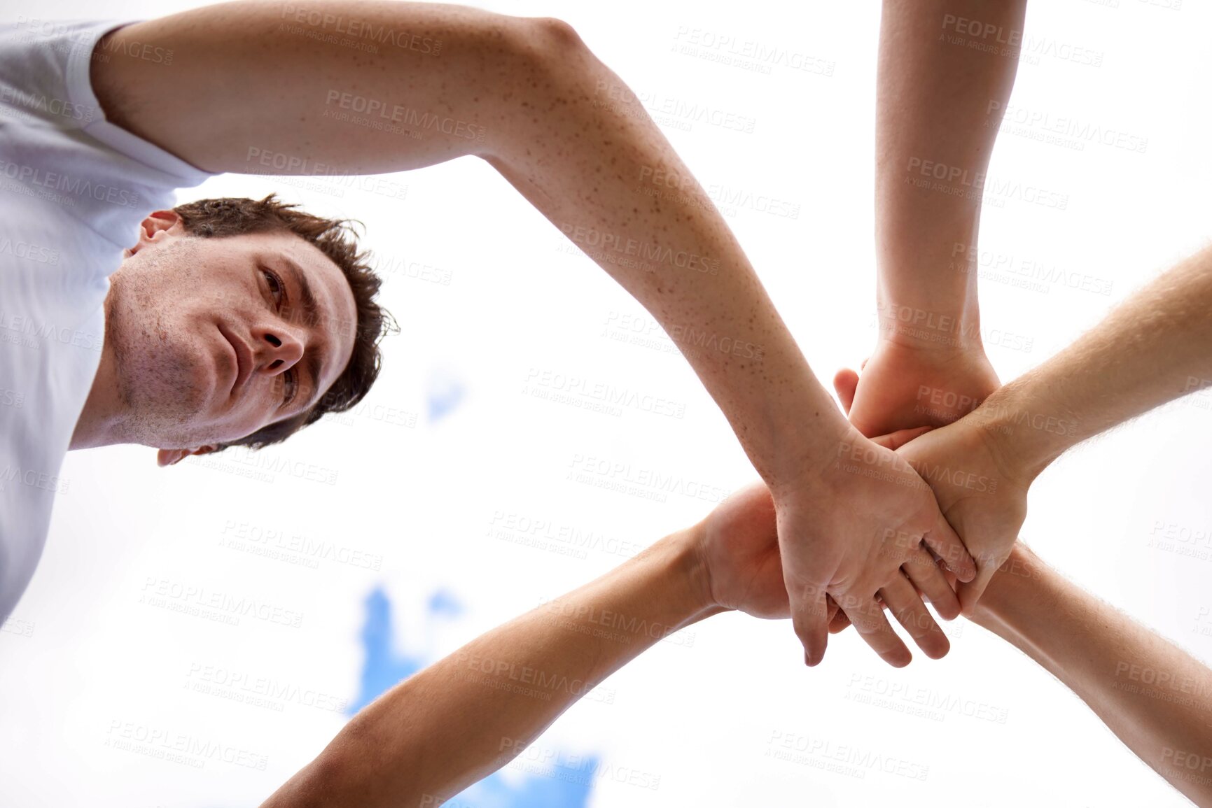 Buy stock photo Team, huddle and hands for support in sports, circle and unity in collaboration by cloudy sky. Male person, community and motivation for match or game in outdoors, low angle and trust in athletes