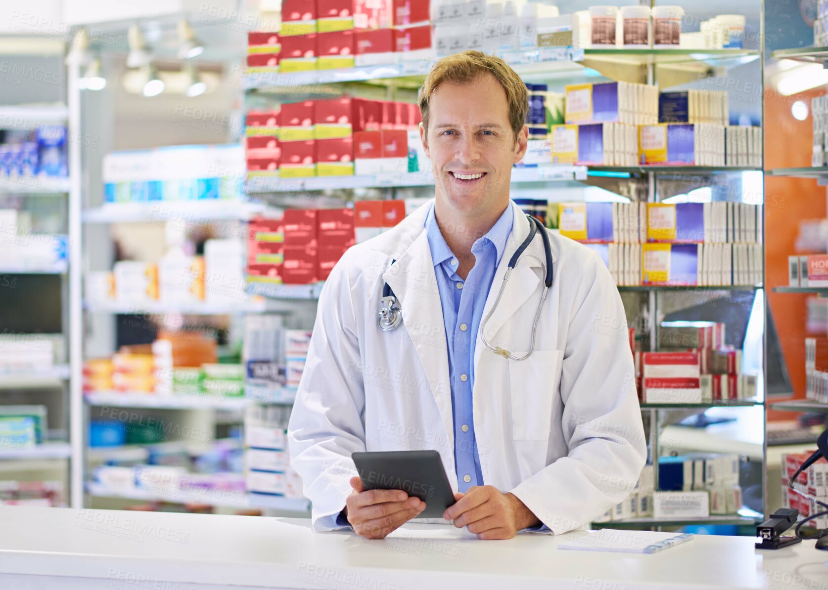 Buy stock photo Chemist, tablet and portrait for stock, checking and medicine in drugstore, pharmacy or health care. Male person, doctor and pharmaceuticals in dispensary for prescription, pills for info or advice