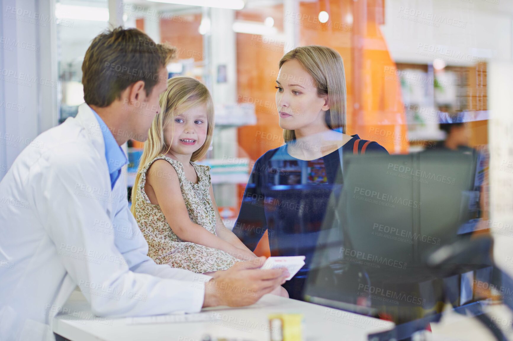 Buy stock photo Pharmacist, woman and child with medicine in store for healthcare, wellness and smile with advice. Pills, mother and daughter with box, supplements and discount for pharmaceutical product at shop