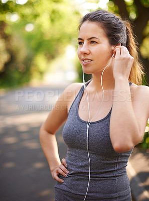 Buy stock photo Training, outdoor and woman with earphones, listening to music and motivation. Healthy person, runner and athlete in park, podcast and wellness with nature, audio and song with sound and radio