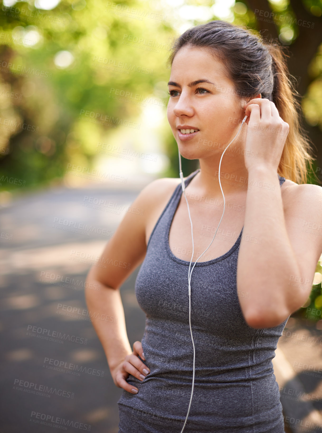 Buy stock photo Training, outdoor and woman with earphones, listening to music and motivation. Healthy person, runner and athlete in park, podcast and wellness with nature, audio and song with sound and radio