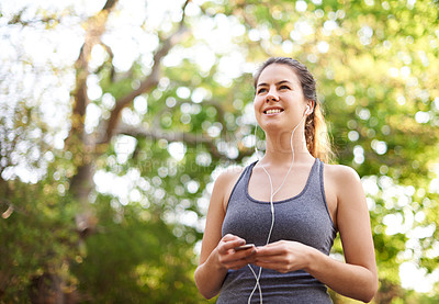 Buy stock photo Nature, listening and woman with earphones, fitness and streaming of music for motivation and runner. Outdoor, training and person with sportswear for exercise, audio and practice for marathon