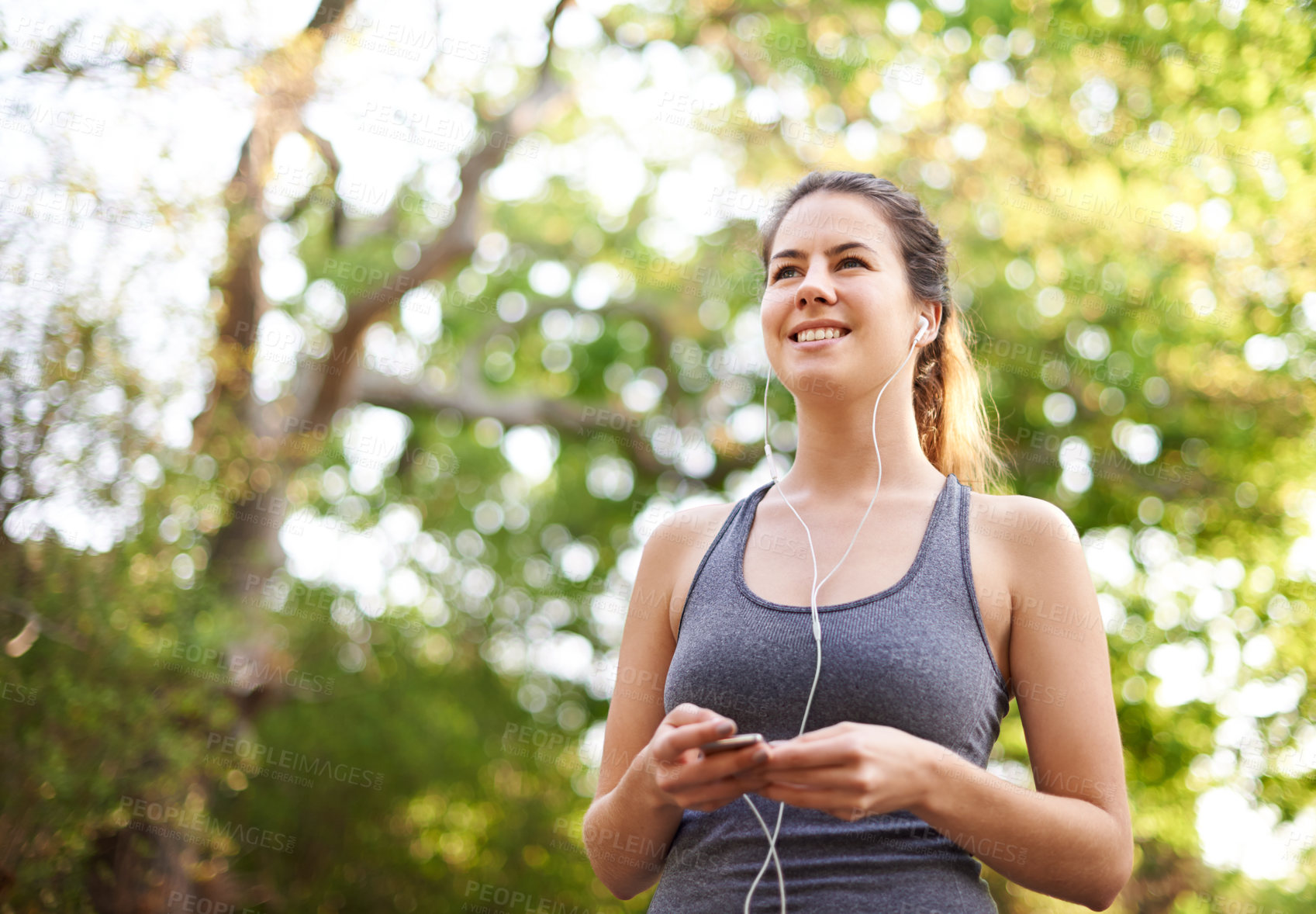 Buy stock photo Nature, listening and woman with earphones, fitness and streaming of music for motivation and runner. Outdoor, training and person with sportswear for exercise, audio and practice for marathon