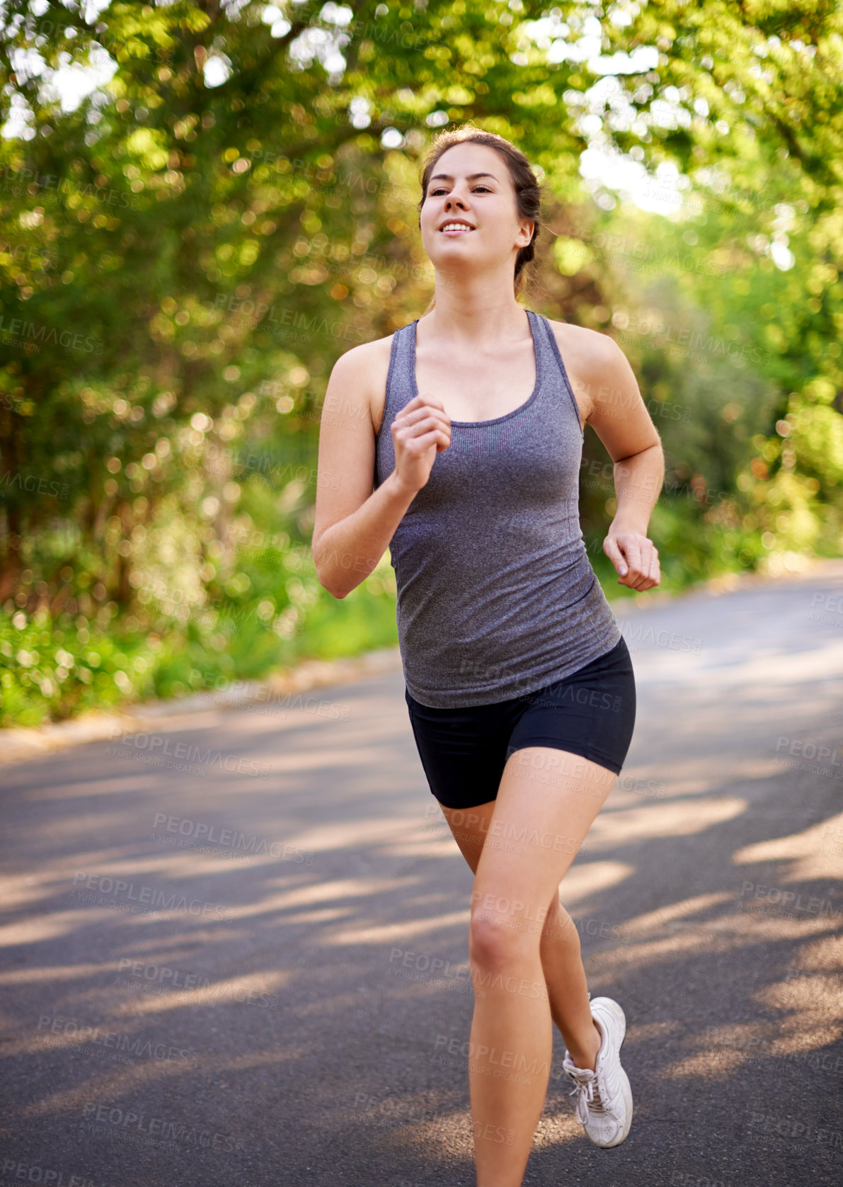 Buy stock photo Running, workout and woman with training, cardio and nature with challenge, wellness or endurance. Healthy person, marathon or athlete with practice, energy or fitness with sports or runner in street