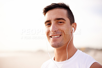 Buy stock photo Earphones, happy and portrait of man with fitness outdoor listening to music, podcast or radio for run. Health, sports and athlete with audio tech for cardio workout, exercise or training playlist.