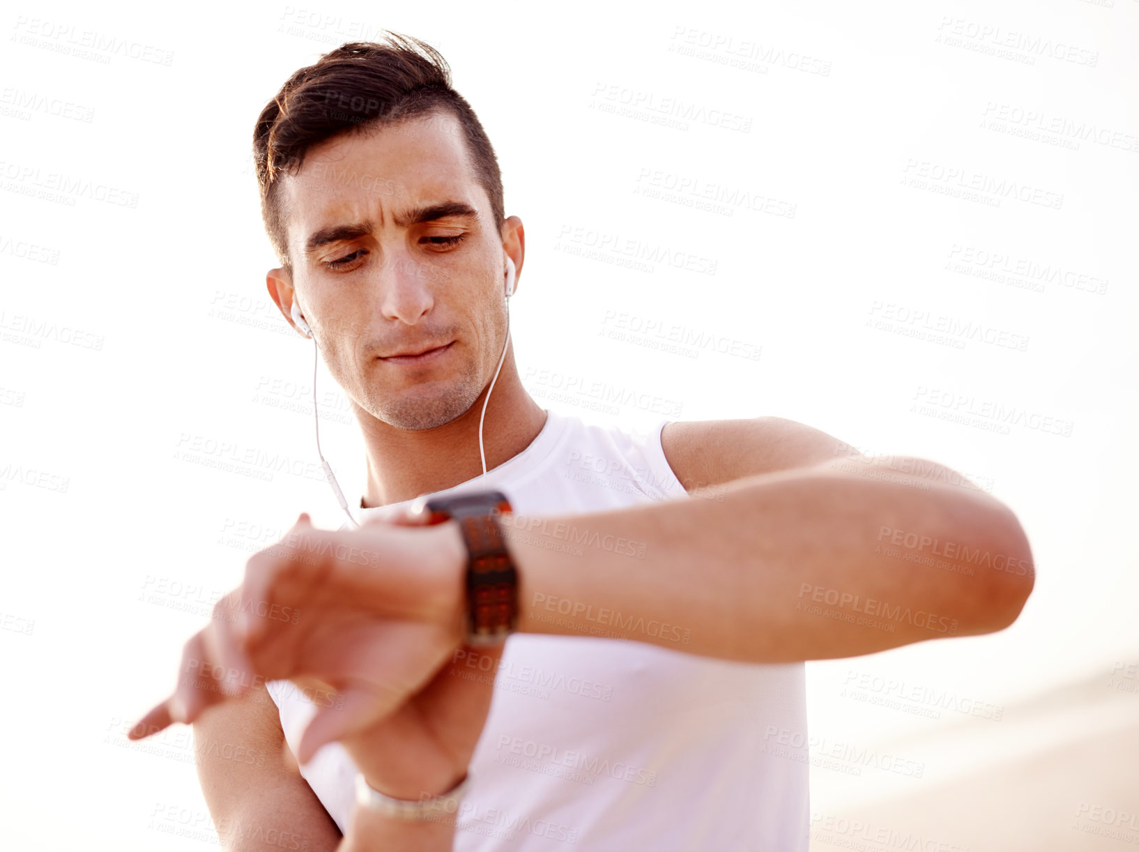 Buy stock photo Smart watch, earphones and man outdoor for workout with fitness tracker app for heart rate. Sports, audio tech and male athlete with digital wristband for cardio activity monitoring with running