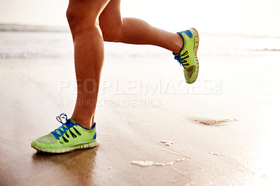 Buy stock photo Man, sand and shoes running on beach for fitness, outdoor cardio and sports workout for exercise. Male person, sneakers and athlete for training in nature, ocean and performance on tropical holiday