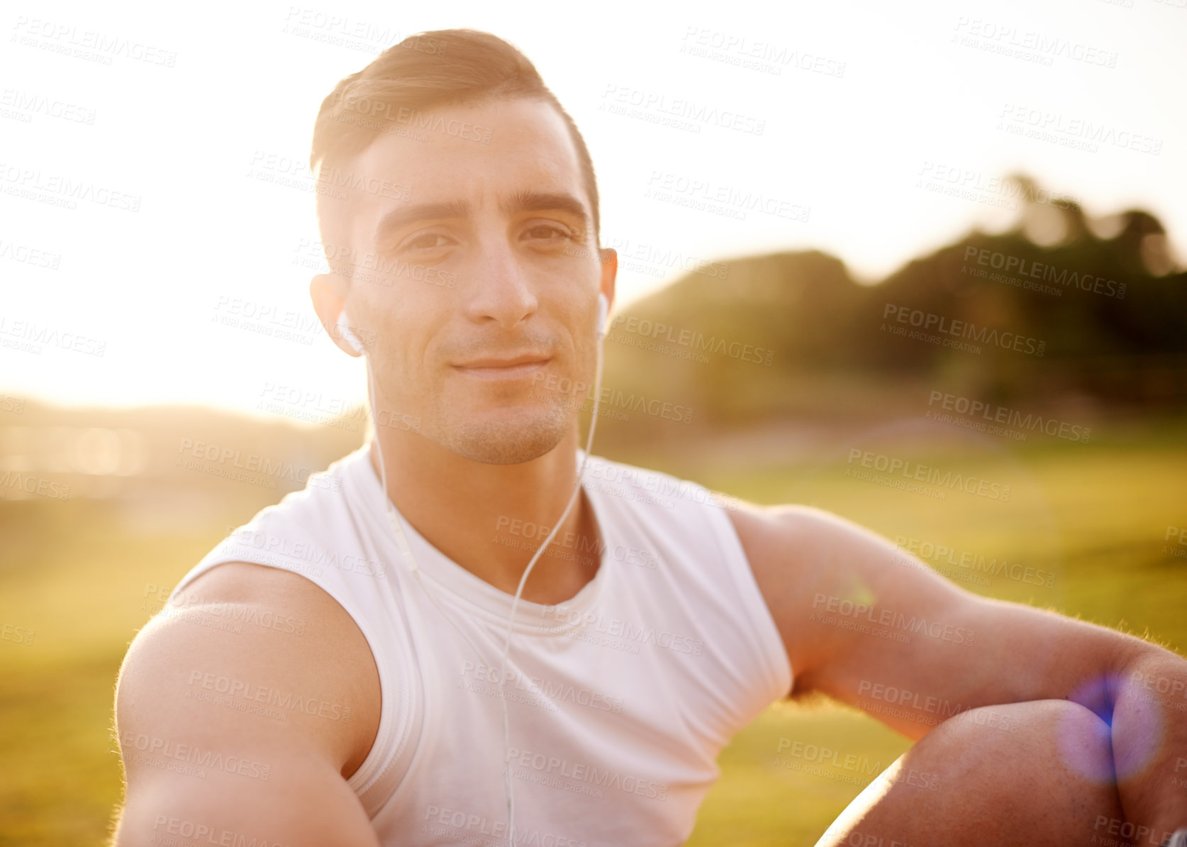 Buy stock photo Fitness, man and portrait with earphones outdoor for music, audio streaming or listening to radio after workout. Athlete, person or online subscription for podcast, exercise break and relax in nature