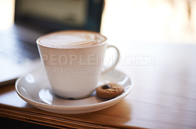 Buy stock photo Coffee, laptop and drink in restaurant for hospitality, service and complimentary cookie. Mug, customer care and latte at cafe table for break, caffeine and cappuccino in cup with tech for networking