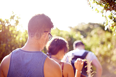 Buy stock photo Friends, back and walking on mountain for countryside, travel or adventure to explore nature. Relax, group of people and journey with natural environment for hiker, hobby and bonding together
