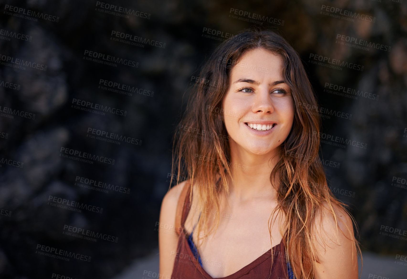 Buy stock photo Rocks, woman and travel with smile, thinking and ideas with wonder, carefree and adventure. Explore, person and girl with summer holiday, ponder and thoughtful with nature, happiness and Bali