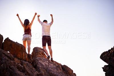 Buy stock photo Victory, back and couple on mountain, sky and celebration for hiking in nature, space and environment. Outdoor, people and success for adventure in summer, travel and achievement for rock climbing