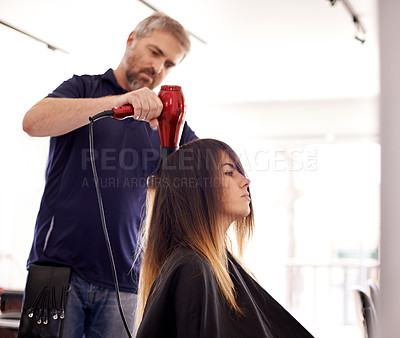 Buy stock photo Beauty, woman and male hairstylist with hairdryer in salon for aesthetic change, hair makeover and smooth texture. Cosmetics, heat appliance and haircare with grooming appointment in small business