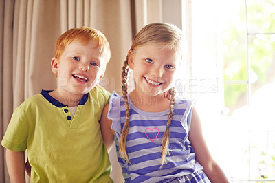 Buy stock photo Happy, relax and portrait of children in home for playing, bonding and sibling connection. Cute, sweet and face of kids chilling together in living room for school holiday or weekend break in house.