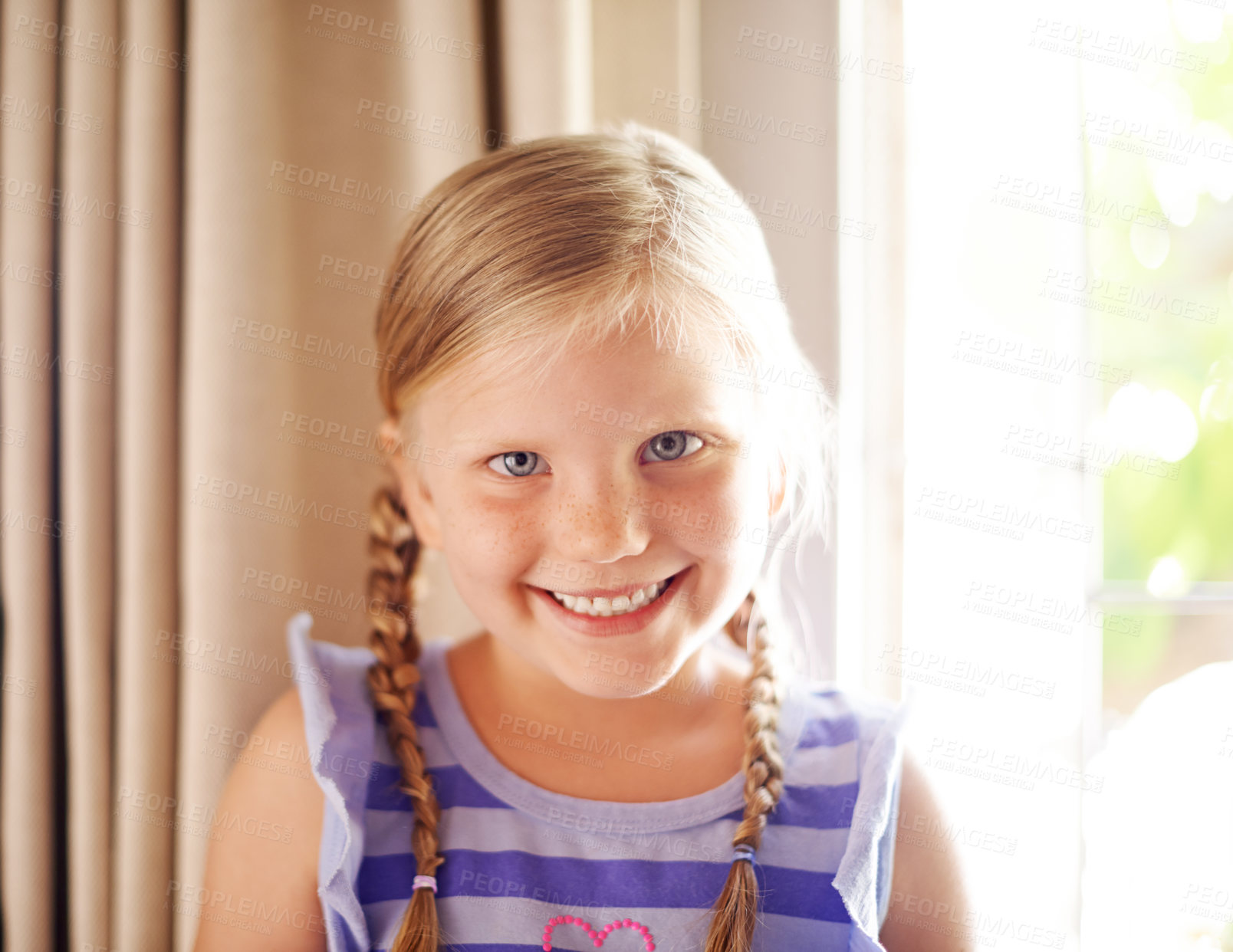 Buy stock photo Portrait, smile and child in home for relax, weekend and break in living room. Cute face, young kid and happy girl by window to chill, adorable and positive for development or growth in Switzerland
