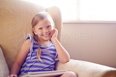 Buy stock photo Portrait, happy child and book in home for learning, education and study in living room. Cute face, smile and girl in house to relax with fantasy story for development, knowledge and growth in USA