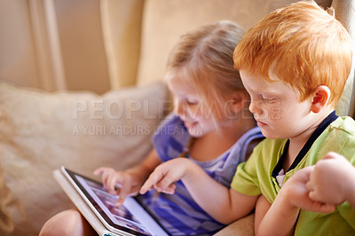 Buy stock photo Tablet, relax and kids on sofa in home playing educational online game for learning together. Happy, siblings and children on digital technology watching movie on streaming app in living room.