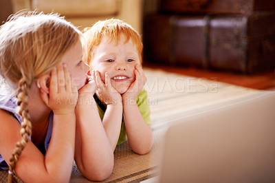 Buy stock photo Thinking, siblings and children with laptop, floor and education with videos, learning and watching. House, sister and brother with knowledge in living room, growth or development for youth with info