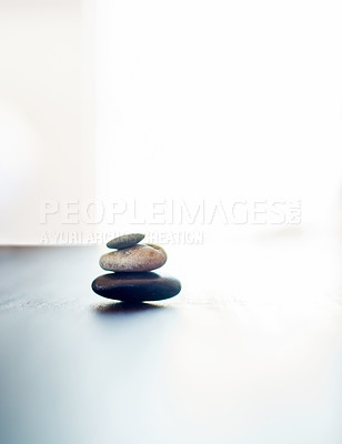 Buy stock photo Spa, balance and stones for beauty, wellness and treatment with heat for deep tissue massage. Salon aesthetic, mockup space and hot rocks for health, muscle tension and detox for stress relief