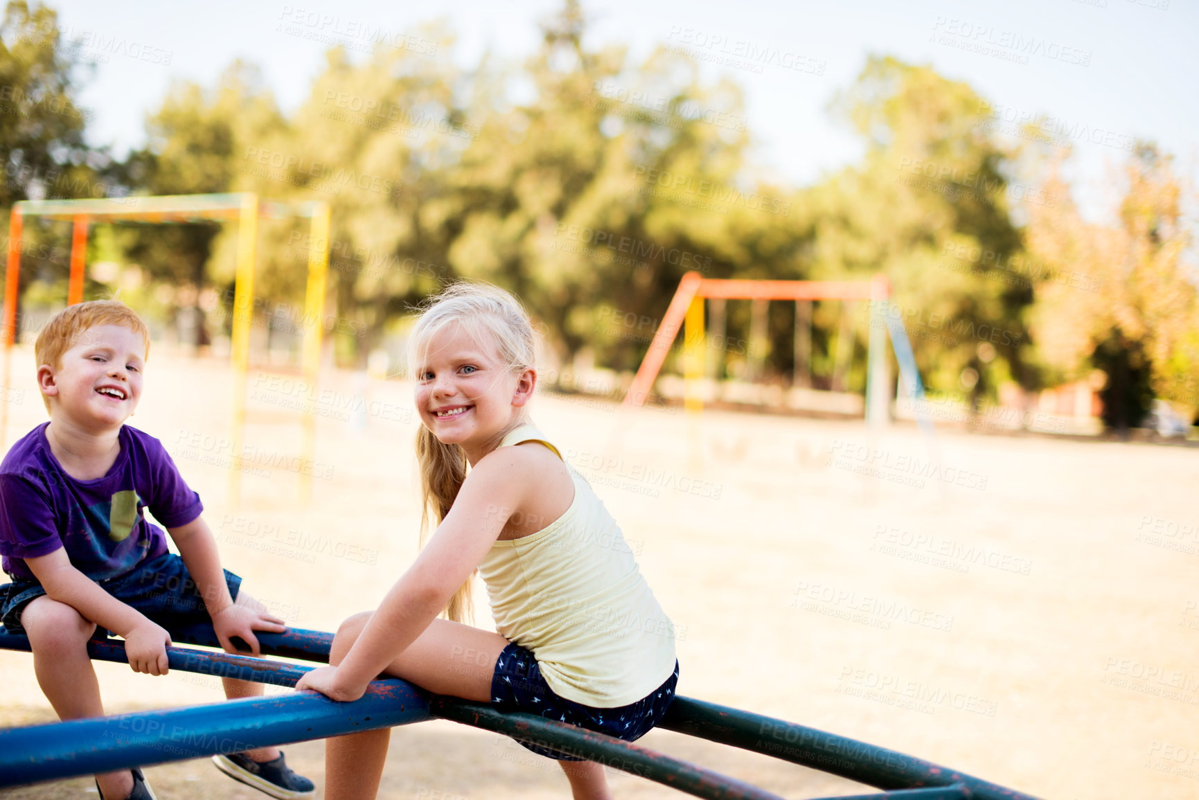 Buy stock photo Happy kids, portrait and carousel at playground outdoor for funny game or excited together. Children, brother and sister playing on park ride on holiday, family vacation or siblings spin on adventure