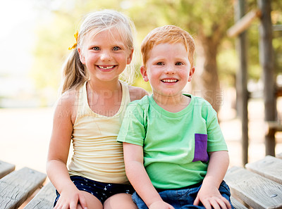 Buy stock photo Happy, portrait and children relax in park for bonding, connection or adventure together. Love, siblings and kids embracing outdoor on playground for development, growth and exploring in nature.