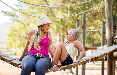 Buy stock photo Family, mother and girl in park, relax and conversation with break, hobby and bonding together. Mama, outdoor and parent with daughter, talking and activity in playground, discussion and happiness