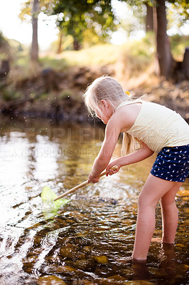 Buy stock photo Kid, lake and play with fishing net on vacation, holiday and adventure in countryside. Hobby, catch and girl child in water with equipment for learning, explore and travel by river in nature outdoor