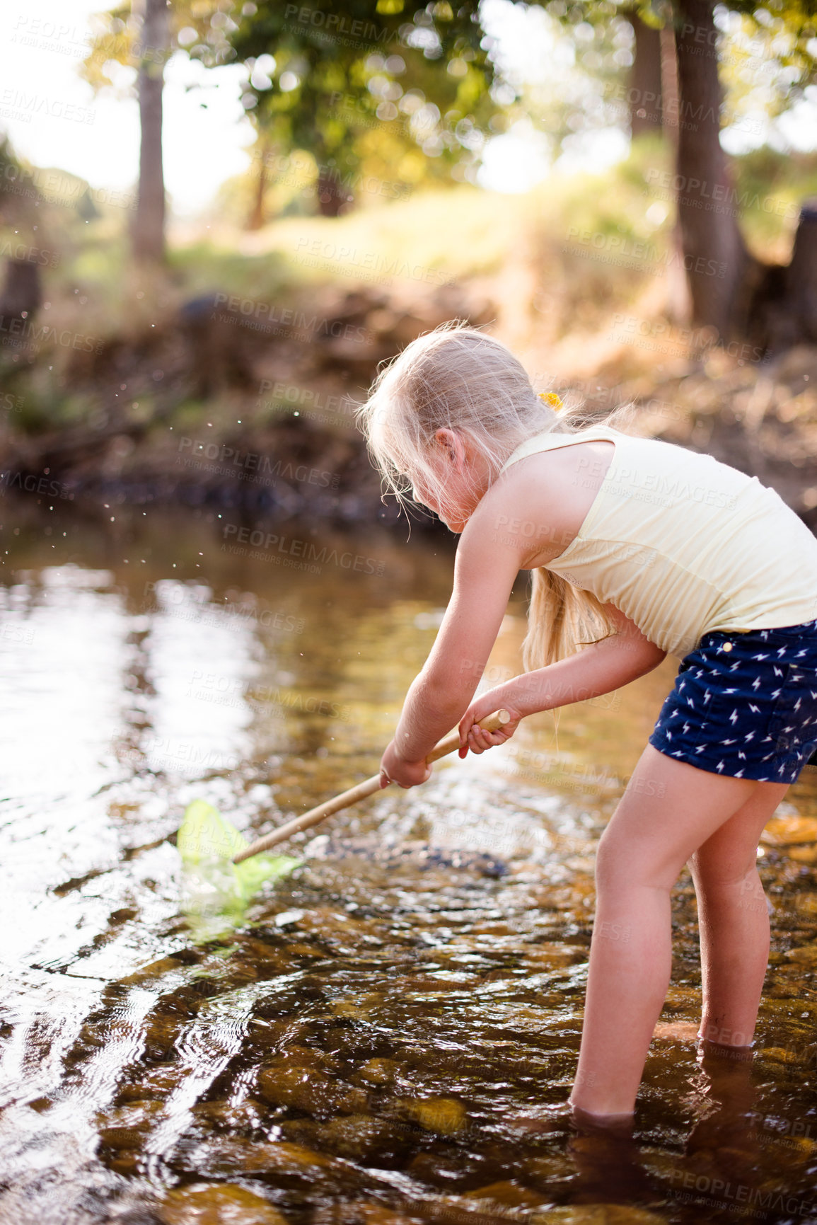 Buy stock photo Kid, lake and play with fishing net on vacation, holiday and adventure in countryside. Hobby, catch and girl child in water with equipment for learning, explore and travel by river in nature outdoor