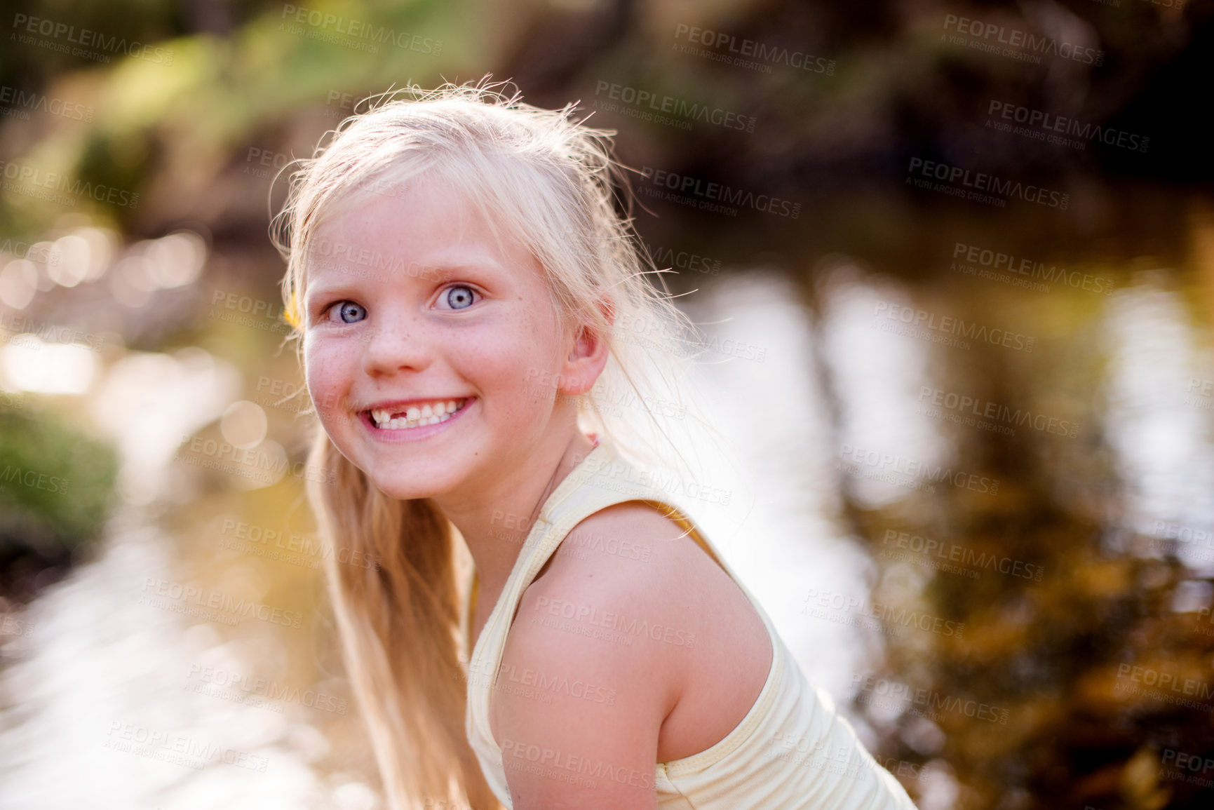 Buy stock photo Portrait, smile and child lake outdoor for sightseeing, explore nature and travel destination with hiking. Happy, girl and water for trekking discovery, young adventure and summer journey on vacation