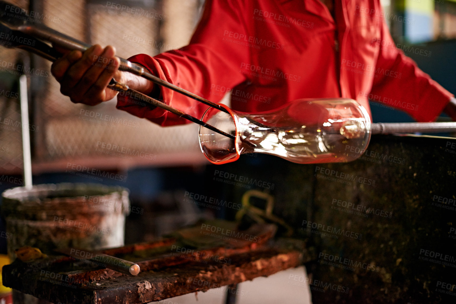 Buy stock photo Hands, worker and tools in glass factory for shape, production process and industry. Glassware, craft and man with equipment for manufacturing art, glassblowing and forming with jacks in workshop