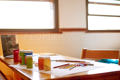 Buy stock photo Painting, paper and pencils on wooden desk in home for artistic, colorful or creative project. Paintbrush, stationery and still life in bedroom of empty apartment for development or learning