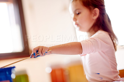Buy stock photo Painting, mess and creative with girl in house for child development, drawing talent and education. Art, kindergarten and sketch with kid and paintbrush in family home for future, youth and color