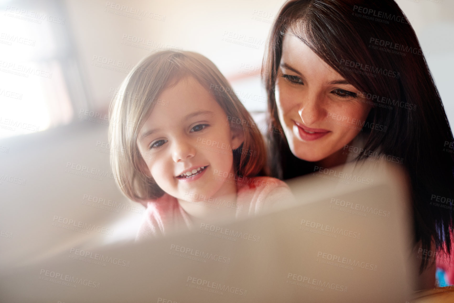Buy stock photo Watching, child and mom with laptop, home and streaming of educational video, growth and elearning. House, woman and bonding with daughter for knowledge, online and studying for cognitive development