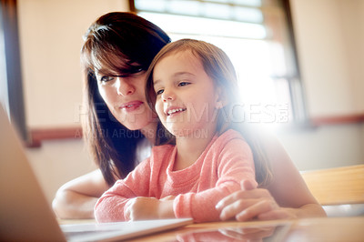 Buy stock photo Laptop, elearning and help with mother with kid for online education app, kindergarten student and creative phonic skills. Child development, teaching and search with woman and girl in family home