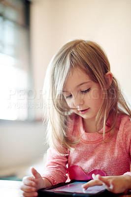 Buy stock photo Kid, student and scroll on tablet in classroom of streaming lesson, elearning website and drawing. Child, girl and digital with online education, reading ebook and studying application for assessment