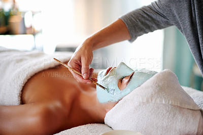 Buy stock photo Skincare, facial and woman with mask in spa for beauty treatment, wellness and healthy skin. Dermatology, luxury salon and person with beautician with clay for anti aging detox, cosmetics and cleanse