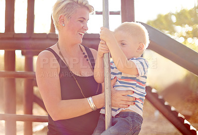 Buy stock photo Slide, playground and mom with child in park for playing, childhood and adventure outdoors. Nature, family and happy mother with young boy for bonding, learning skills and development on jungle gym