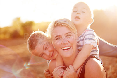 Buy stock photo Portrait, outdoor and mama with boys, hug and bonding together with smile, care and funny. Family, single parent and happy mother with children, embrace and play with love, support and countryside