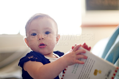 Buy stock photo Development, portrait and reading with baby in home for curiosity, learning or progress as innocent youth. Growth, playing and story book with adorable infant girl in nursery of apartment for fun