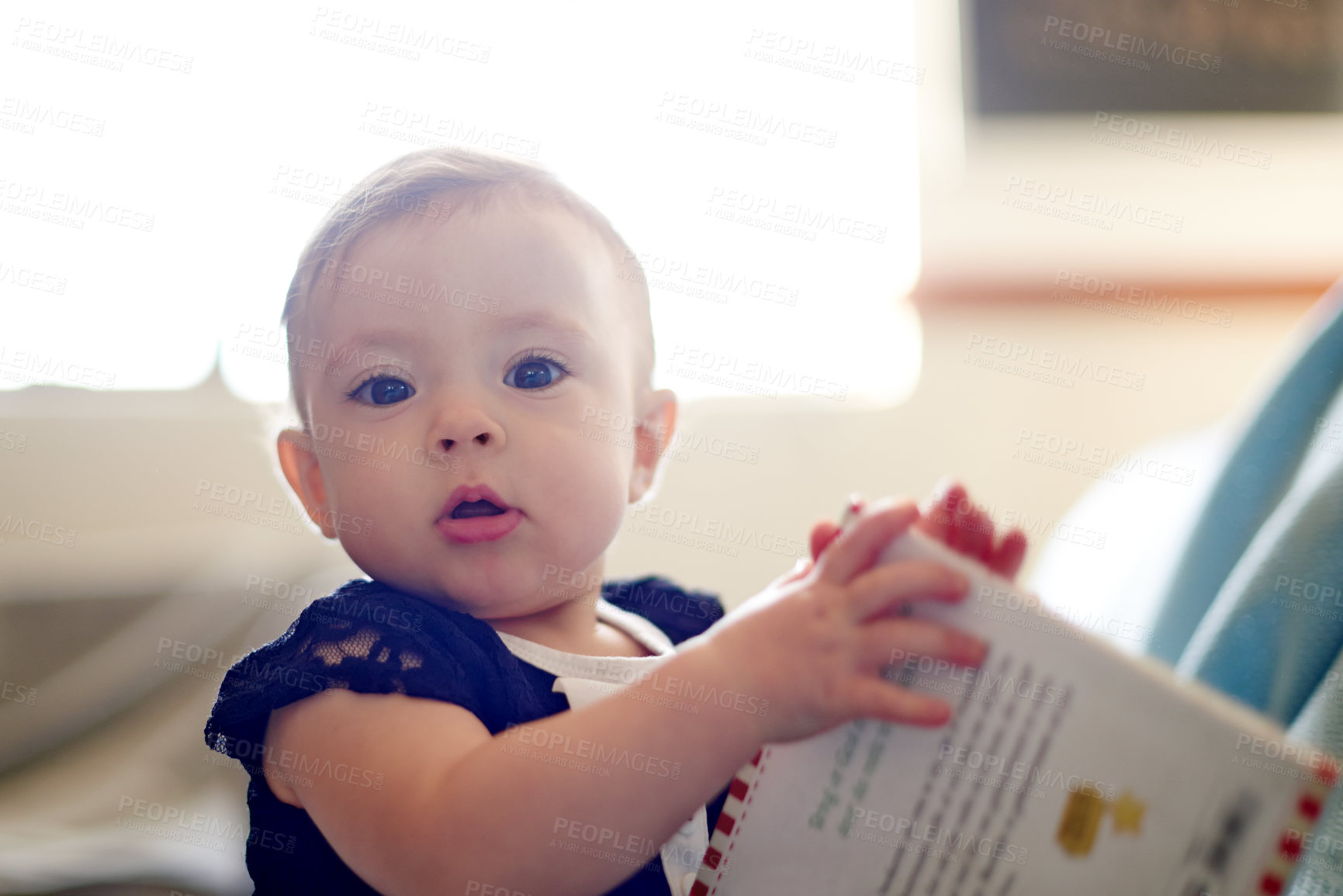 Buy stock photo Development, portrait and reading with baby in home for curiosity, learning or progress as innocent youth. Growth, playing and story book with adorable infant girl in nursery of apartment for fun