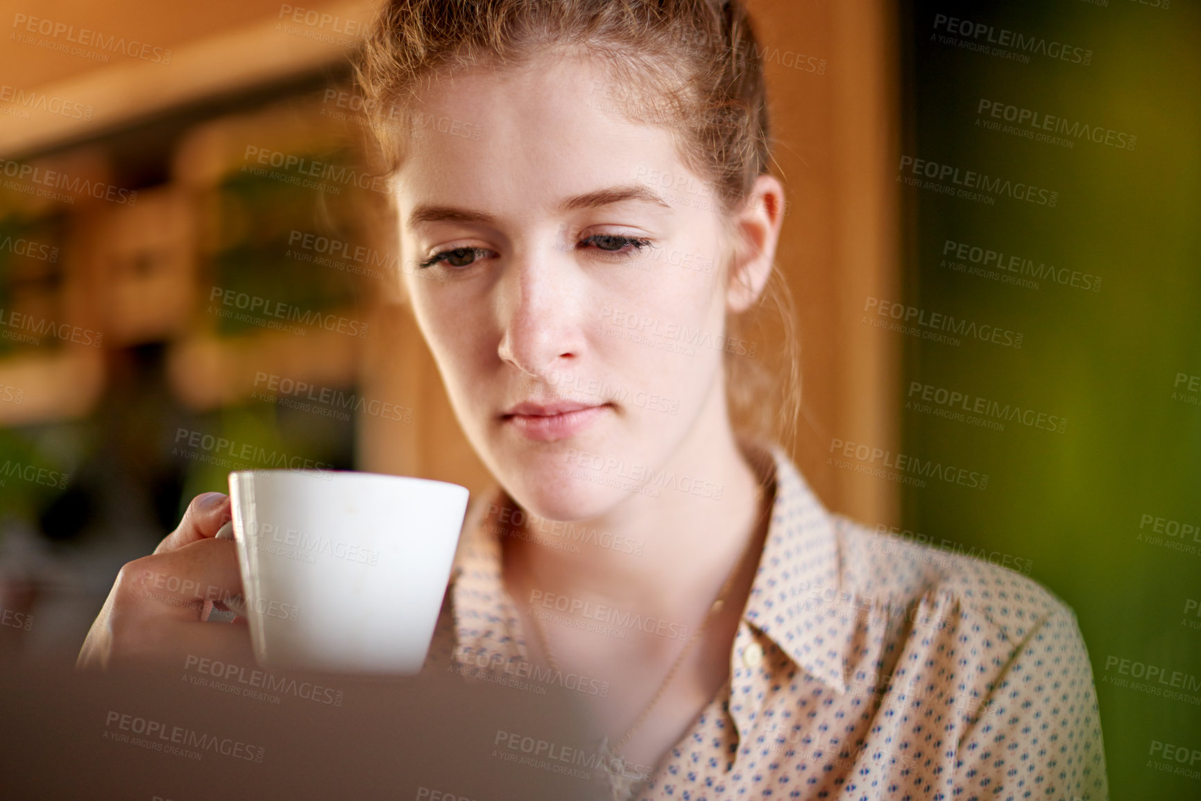Buy stock photo Drink, remote work and woman on laptop in coffee shop, reading email and editing news for politics. Cafe, freelancer and journalist on computer for online story, article and report with latte cup