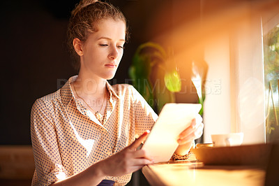 Buy stock photo Coffee shop, morning and business woman on tablet in cafe for social networking, internet and research. Remote work, diner and person on digital tech for website, connection and online in restaurant